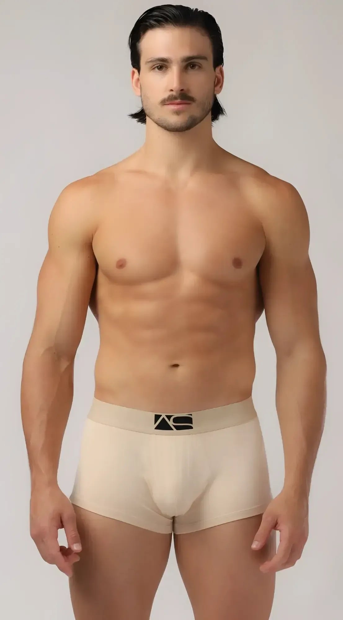 Beige menâs boyshorts briefs with black logo on waistband made from soft breathable fabric for everyday comfort