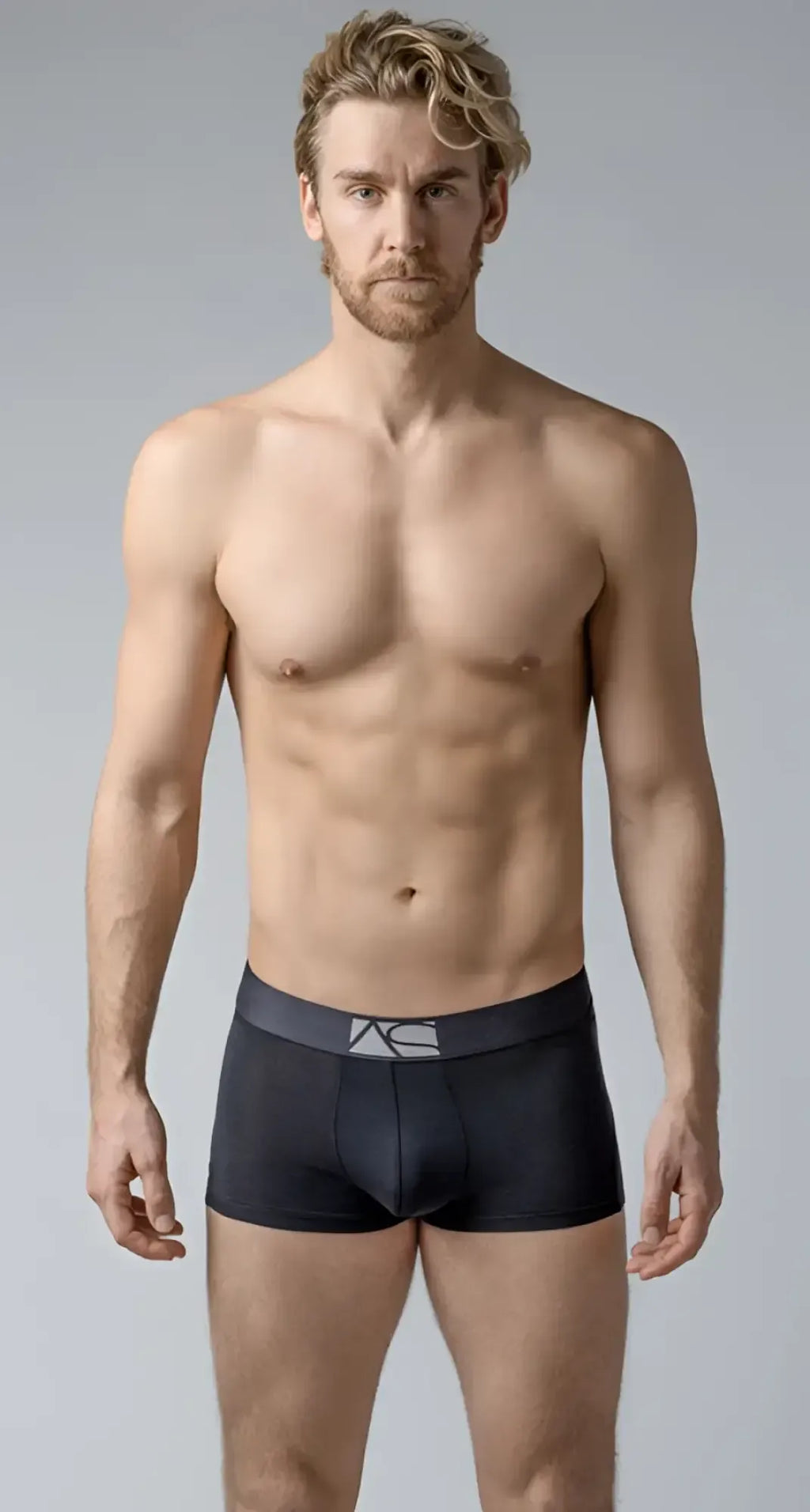 Black menâs briefs with a dark gray waistband featuring the ac logo in boyshorts style
