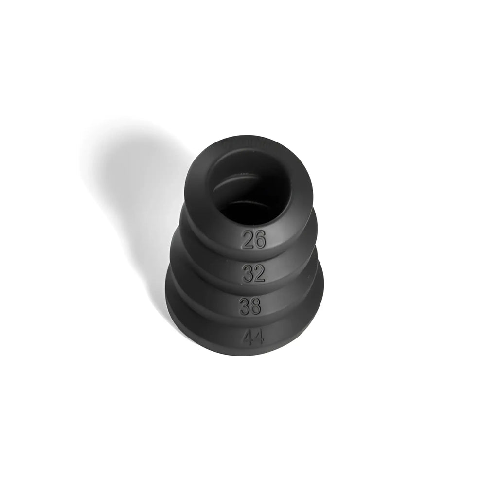 Black rubber sleeve with graduated inner diameters 26 32 38 and 44 in brutus big bulge silicone cock ring 4 pc set