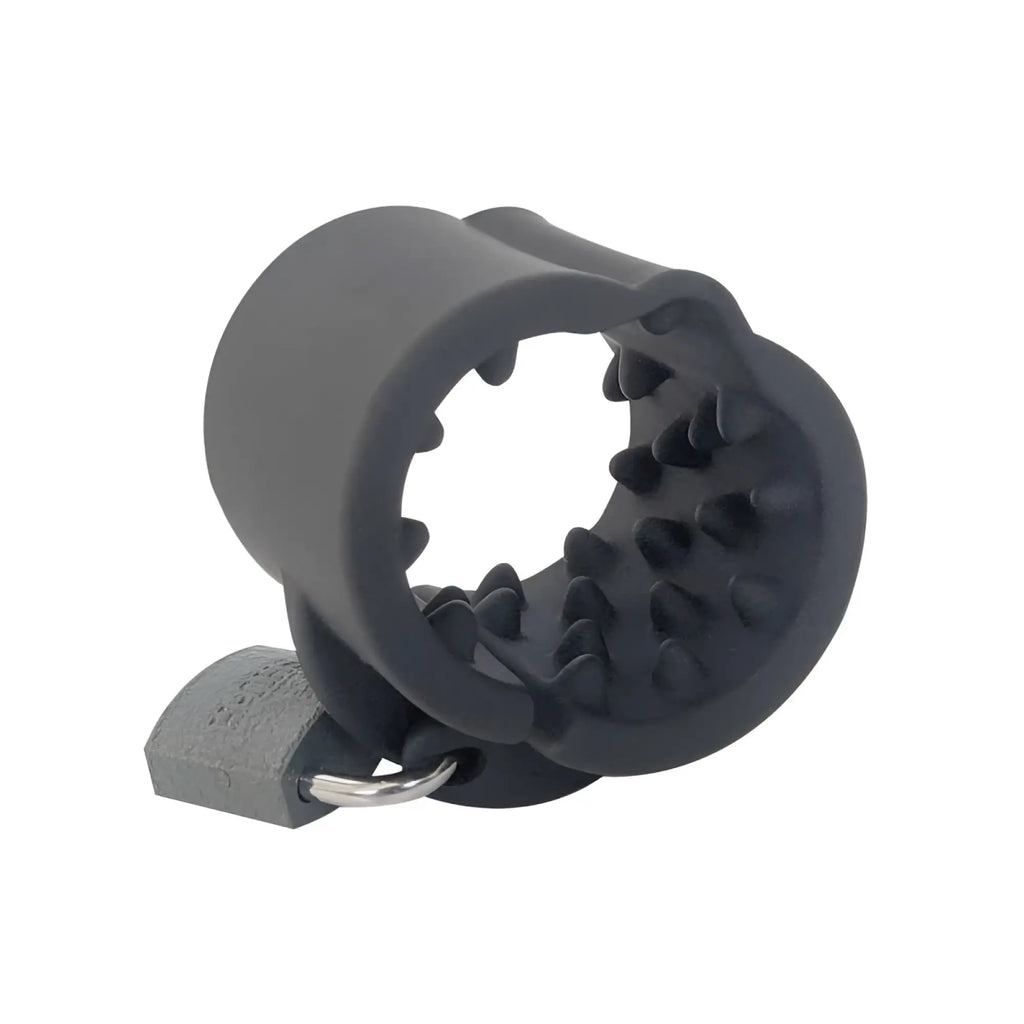 Black silicone cock ring with spiked interior and attached gray padlock from brutus cruncher lockable ball stretcher