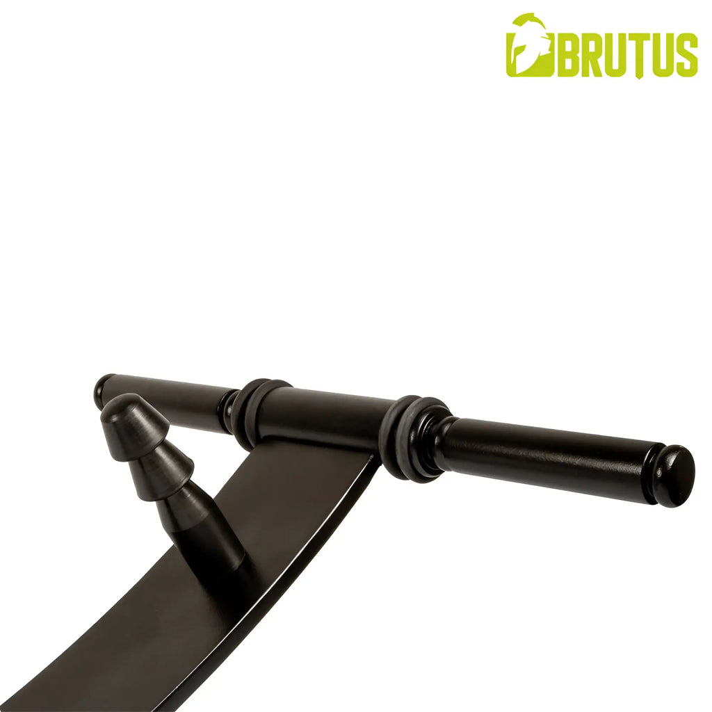 Black matte metal barbell rack with curved support arms and rounded end caps in brutus deep rocker solo shafting cradle