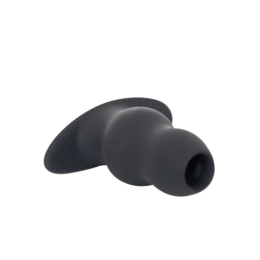 Black silicone earbud tip with rounded ergonomic design and smooth matte finish for brutus ergo bum tunnel plug xxl