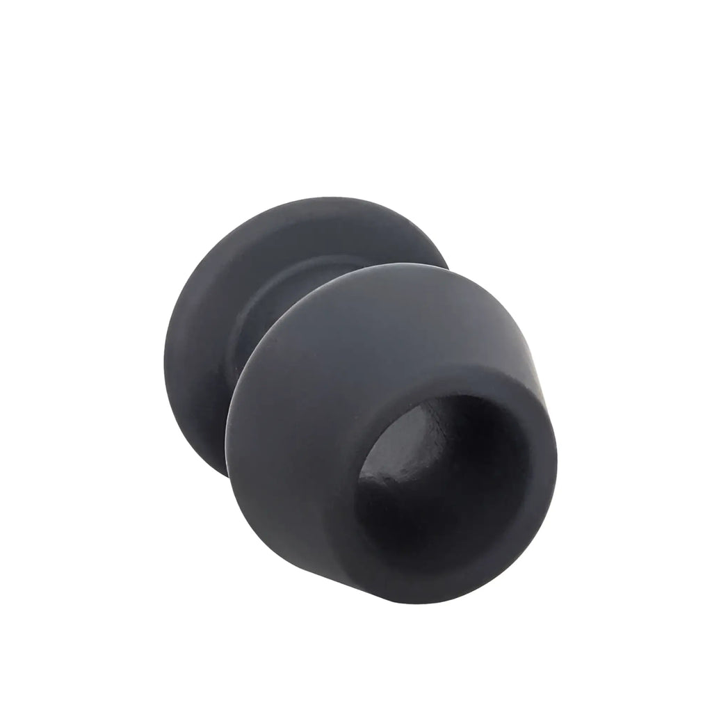 Black silicone earplug with rounded tapered design and smooth surface from brutus gobbler silicone tunnel plug m m product