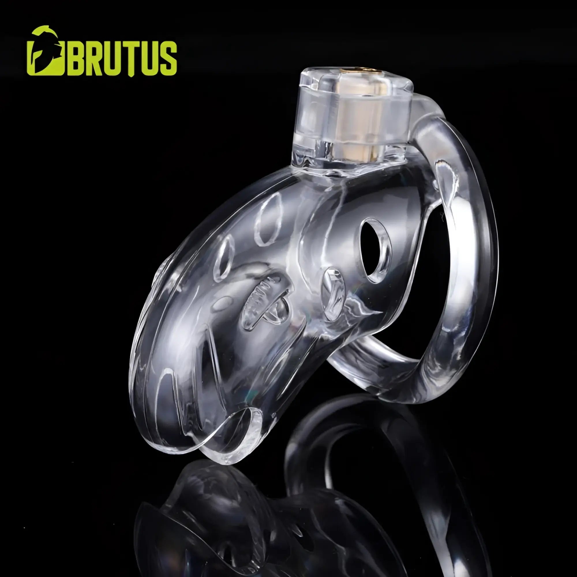 Clear plastic chastity cage with transparent molded design and gold-toned metal insert by brutus shark chastity cage clear