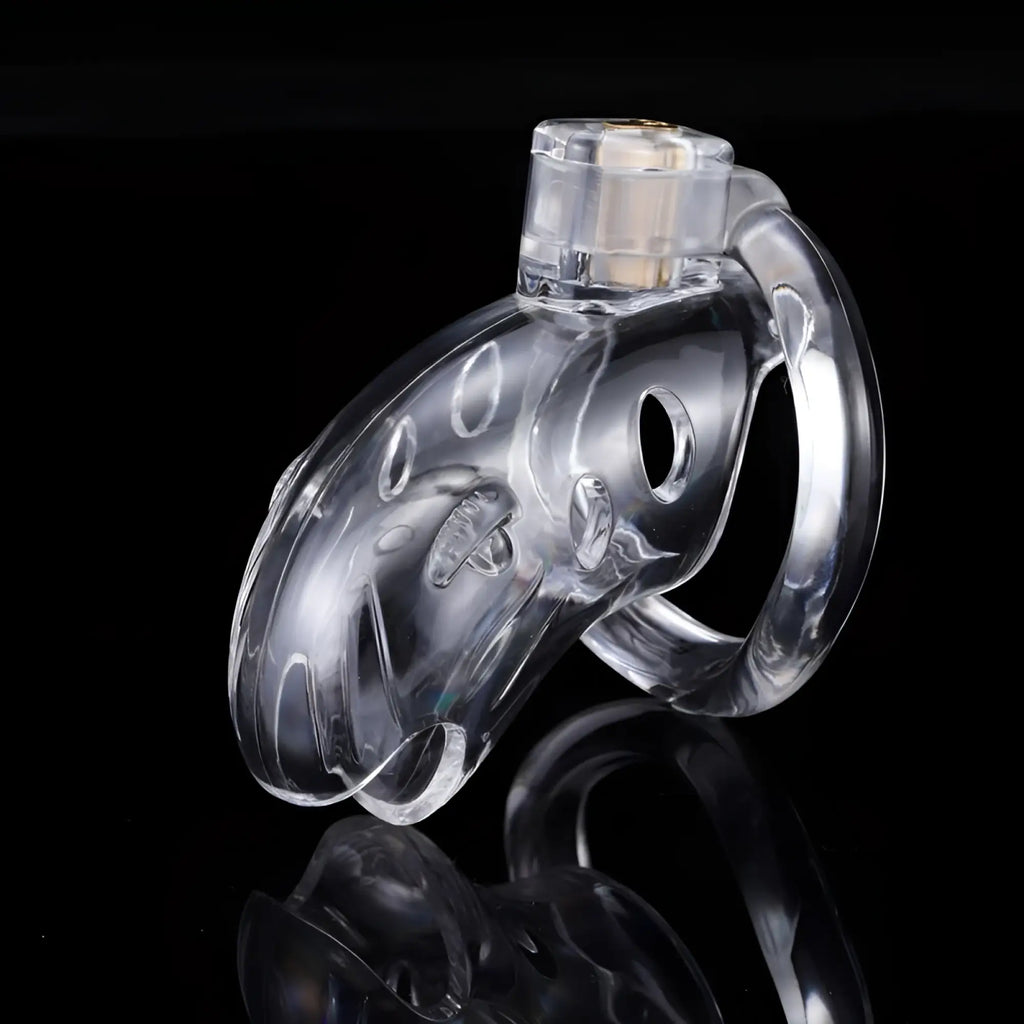Brutus brutus shark chastity cage clear with transparent ring and gold toned metal insert made of clear plastic