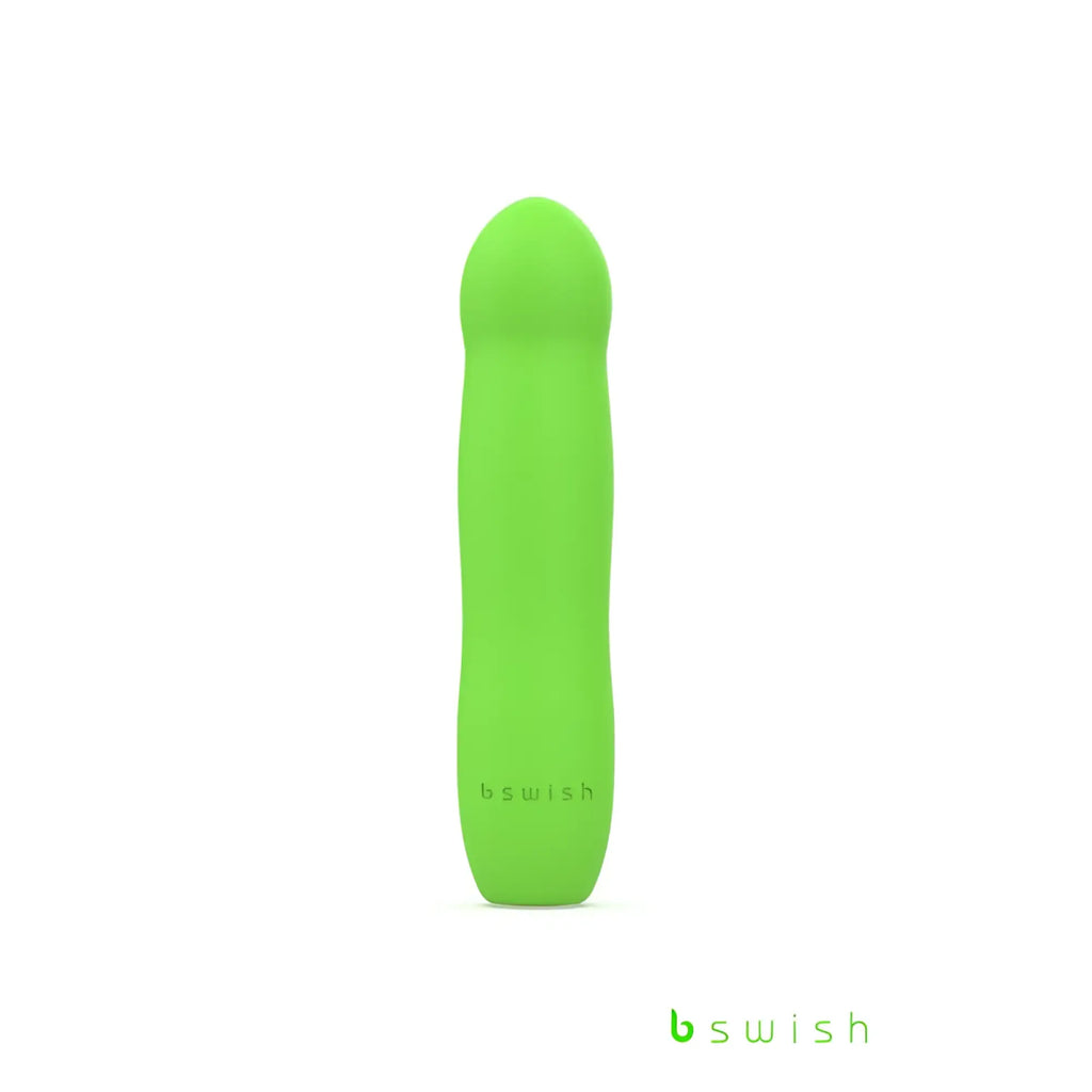 A sleek lime green bswish bdesired infinite deluxe vibratable toy with smooth matte finish and rounded contours