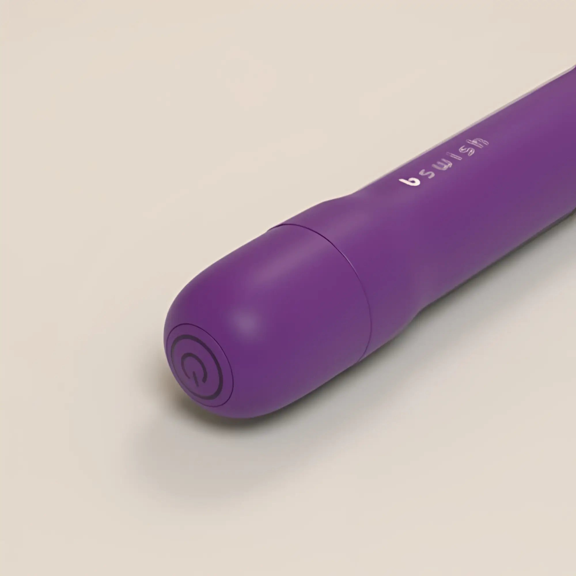 Purple bswish bgee classic adult toy with smooth rounded design and spiral logo on the tip