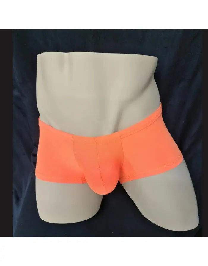 Orange boxer underwear displayed on a mannequin featuring a snug fit and soft material by Arroyman.