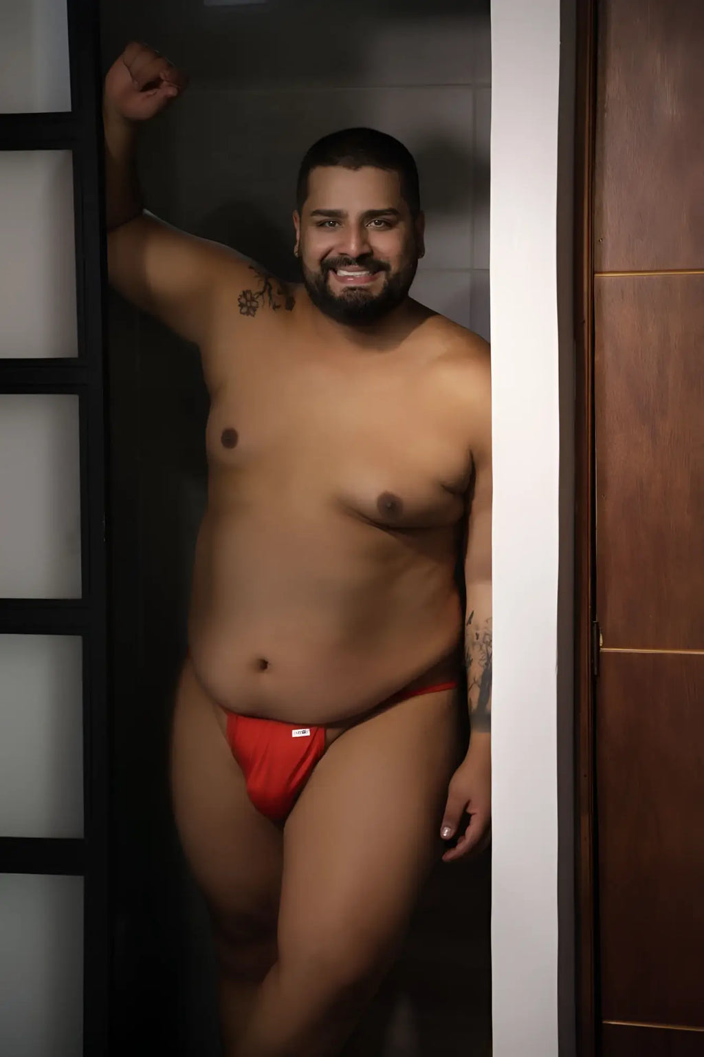 Red CandyMan 9586X thong briefs with a small white logo on the front in soft stretch fabric