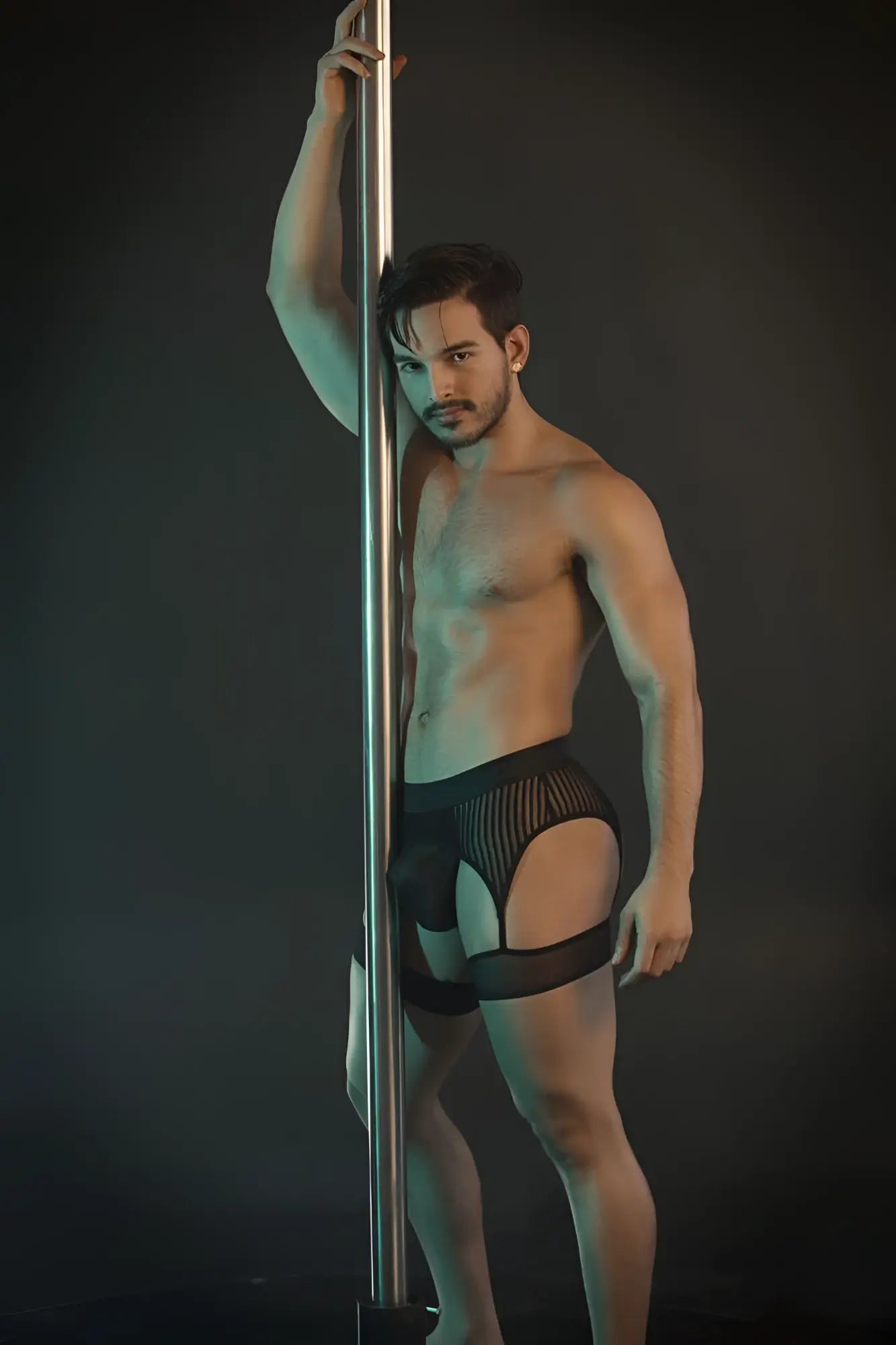 CandyMan 99403 black pole dance briefs with black mesh and solid panels designed for performance and style