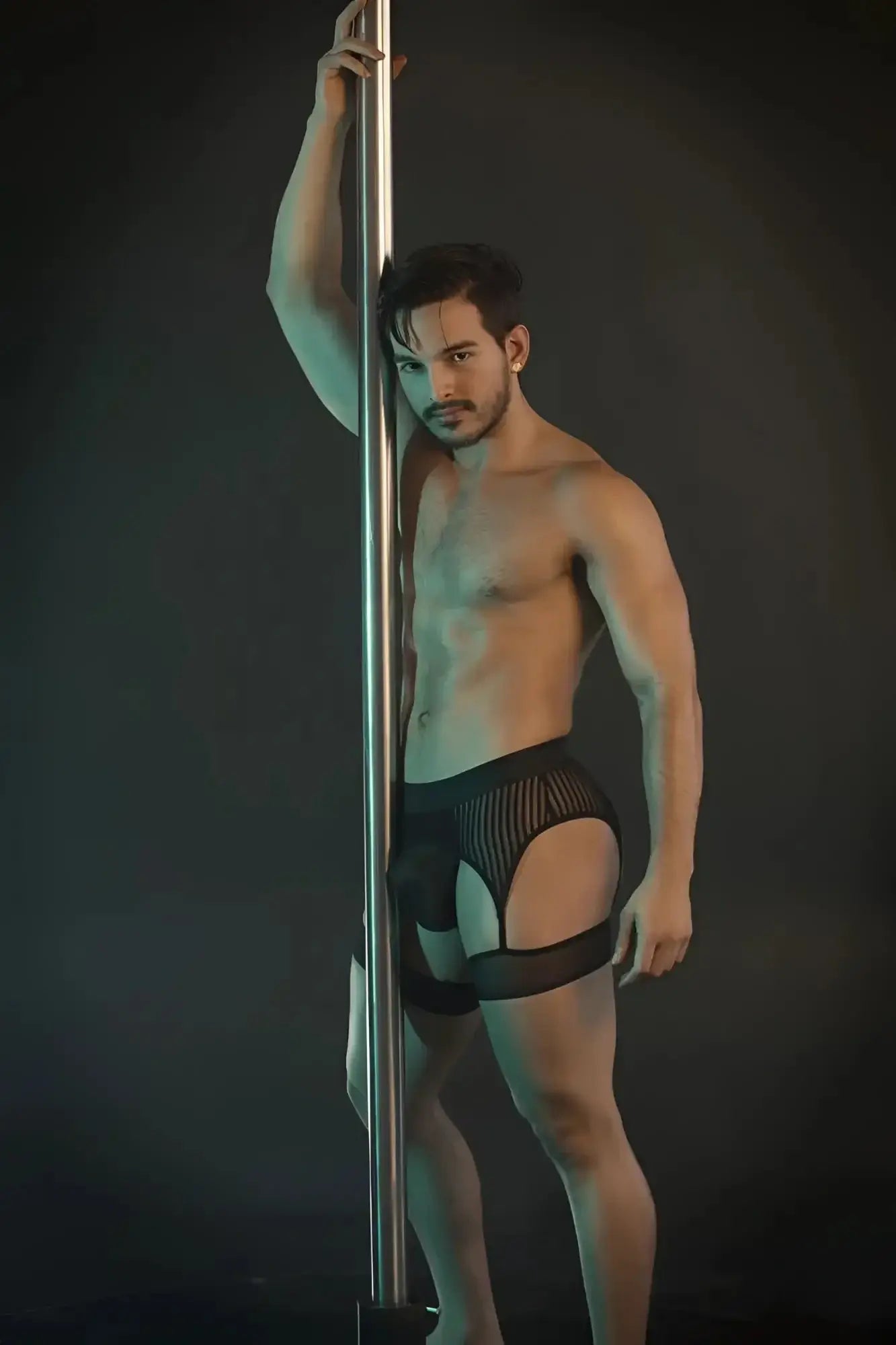 CandyMan 99403 black pole dance briefs with black mesh and solid panels designed for performance and style