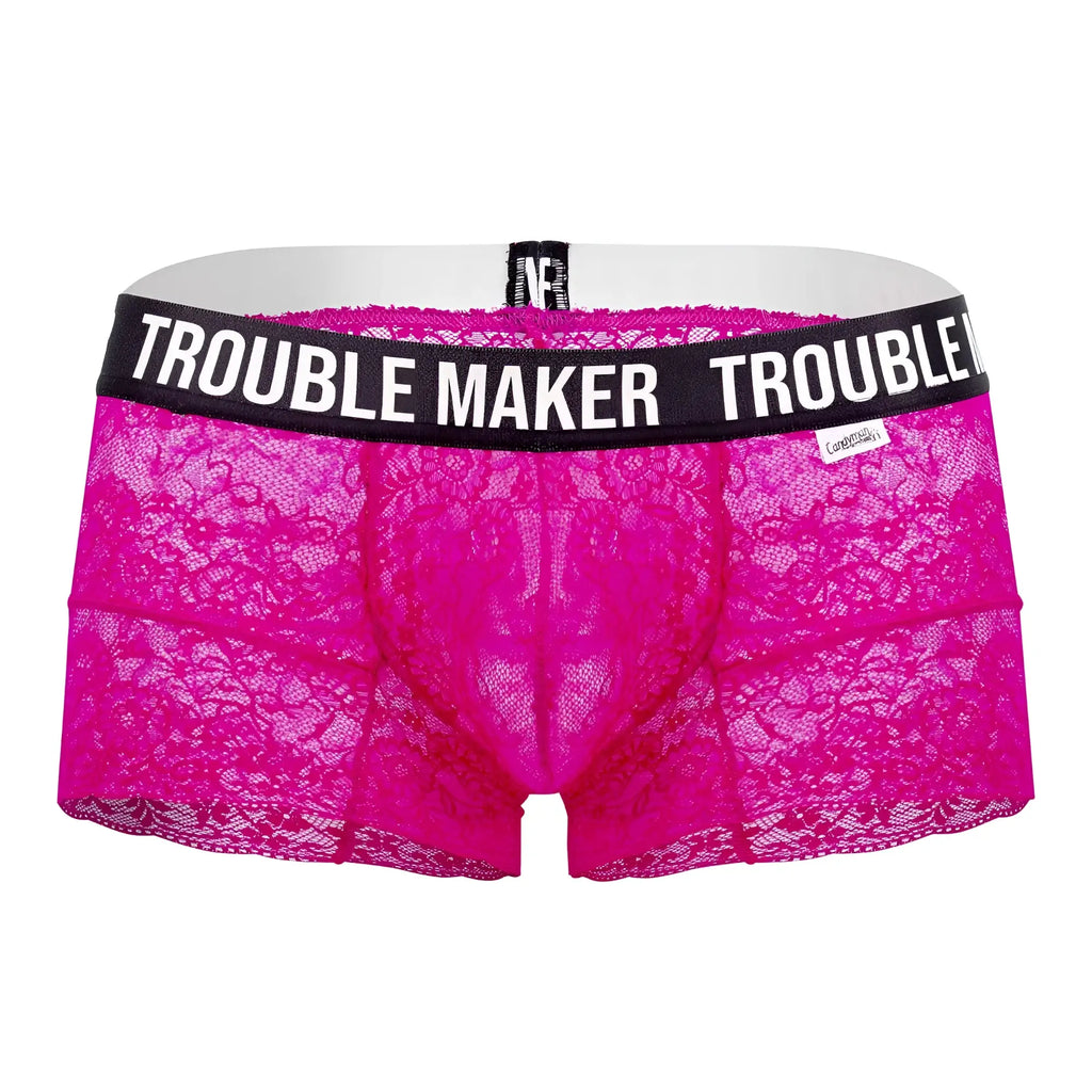 Bright pink lace men’s underwear trunks with black waistband and trouble maker text in white by CandyMan