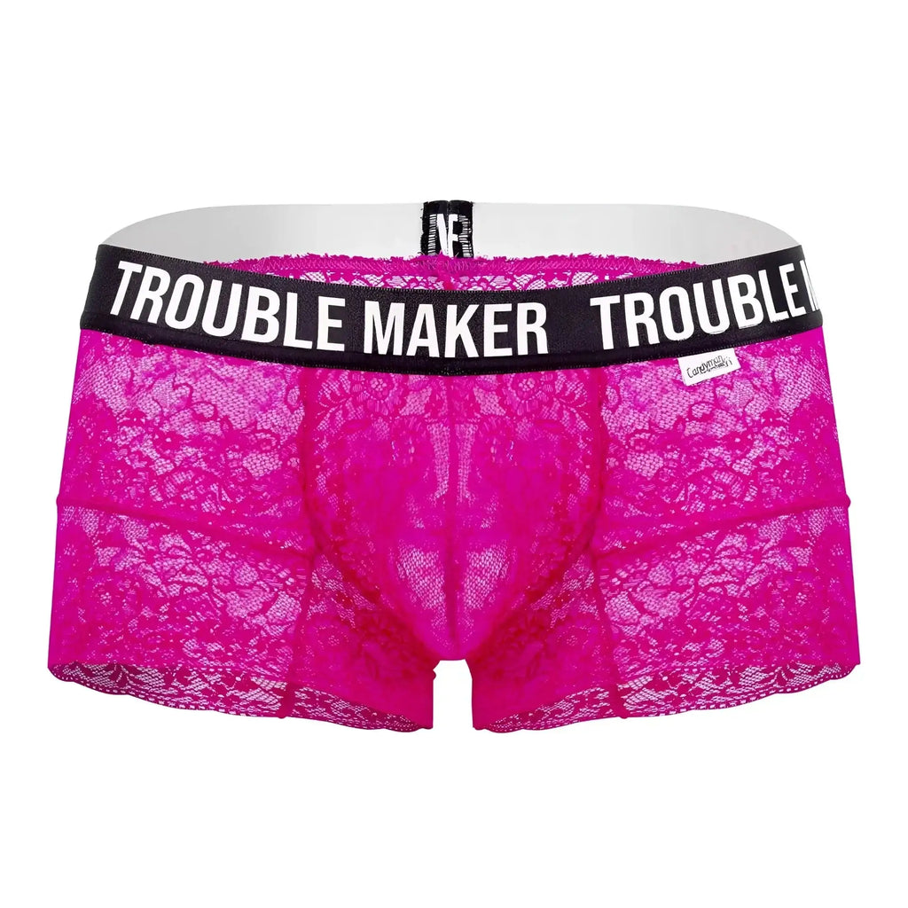 Bright pink lace men’s underwear trunks with black waistband and trouble maker text in white by CandyMan