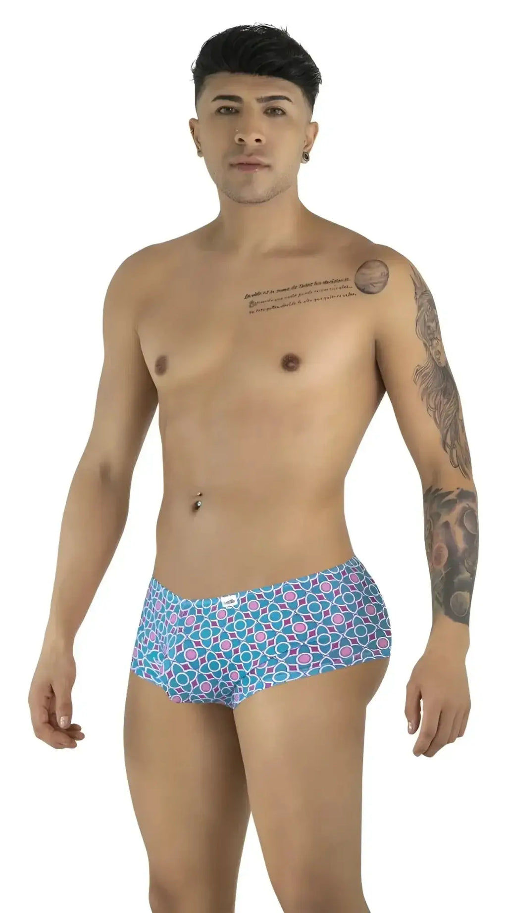 Front view of model wearing CandyMan 99922 blue printed trunks.
