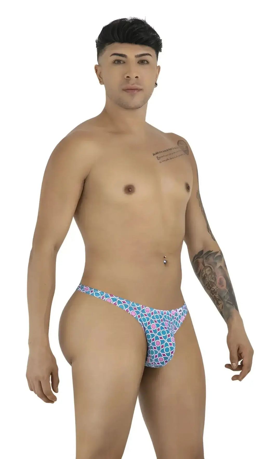 CandyMan 99924 thong in printed blue, lifestyle shot featuring a model posing in the underwear.