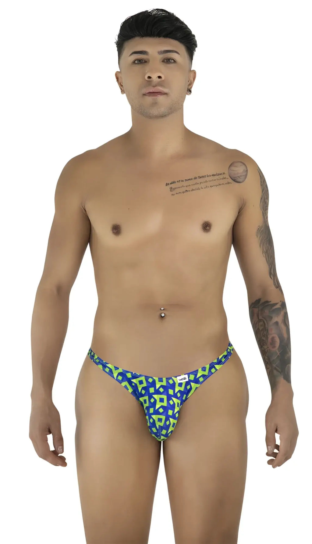 Front view of a man wearing the CandyMan 99924 thong in a printed navy geometric pattern.