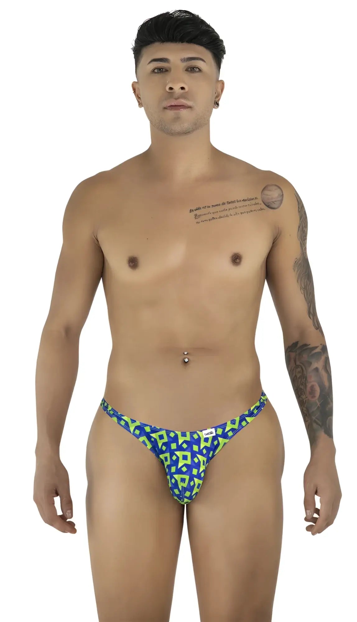 Front view of a man wearing the CandyMan 99924 thong in a printed navy geometric pattern.