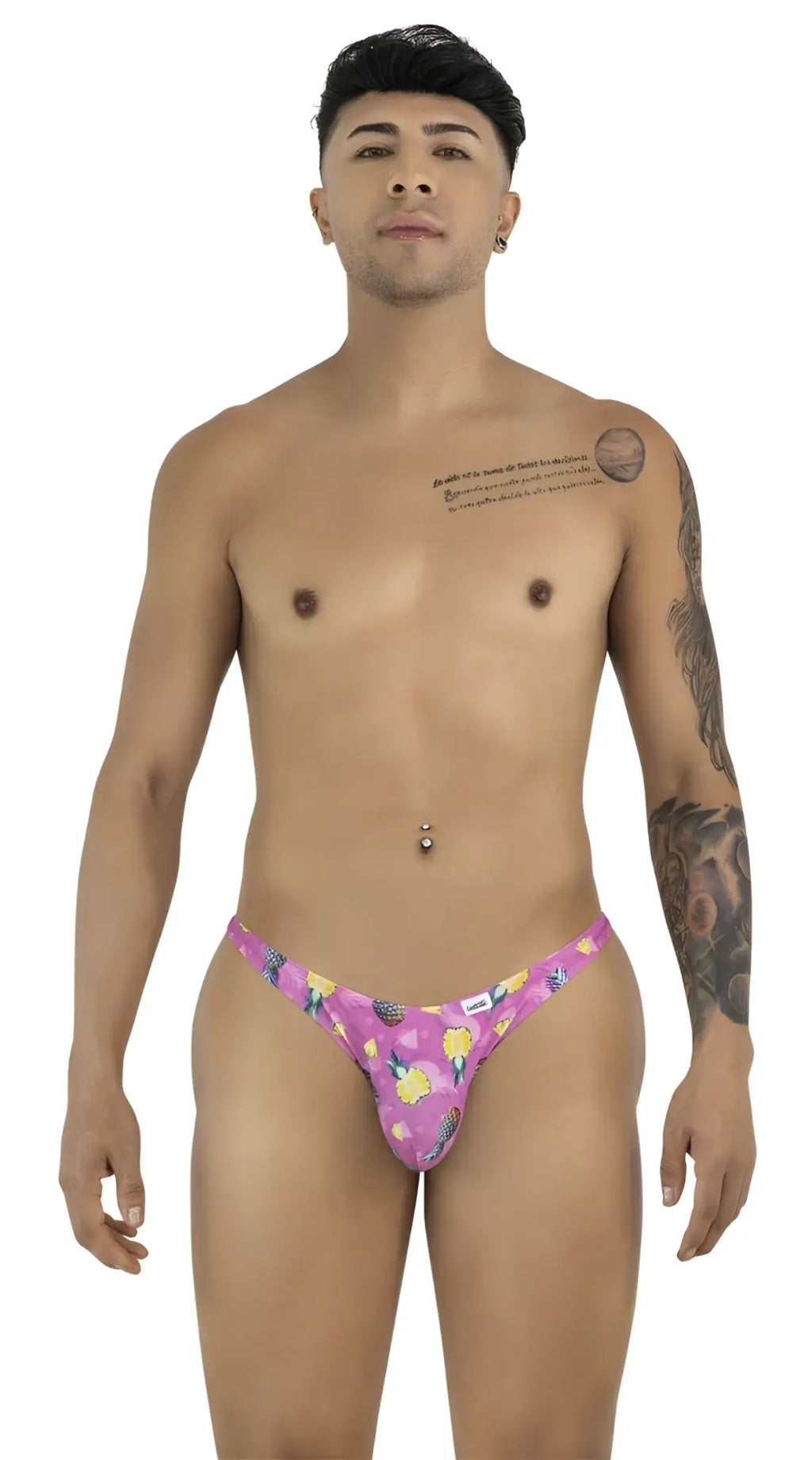 Front view of CandyMan 99924 thong in pink pineapple print on a male model.
