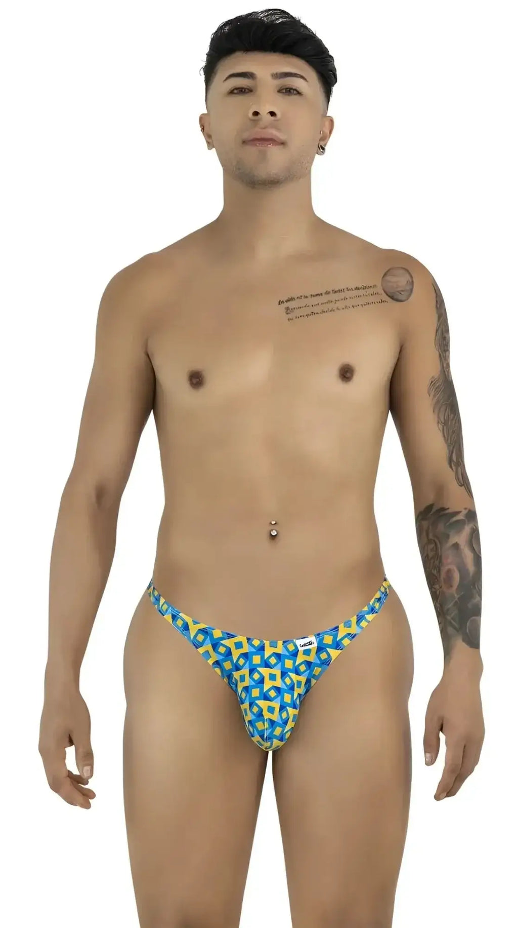 Front view of CandyMan 99924 thong in printed turquoise on a male model.