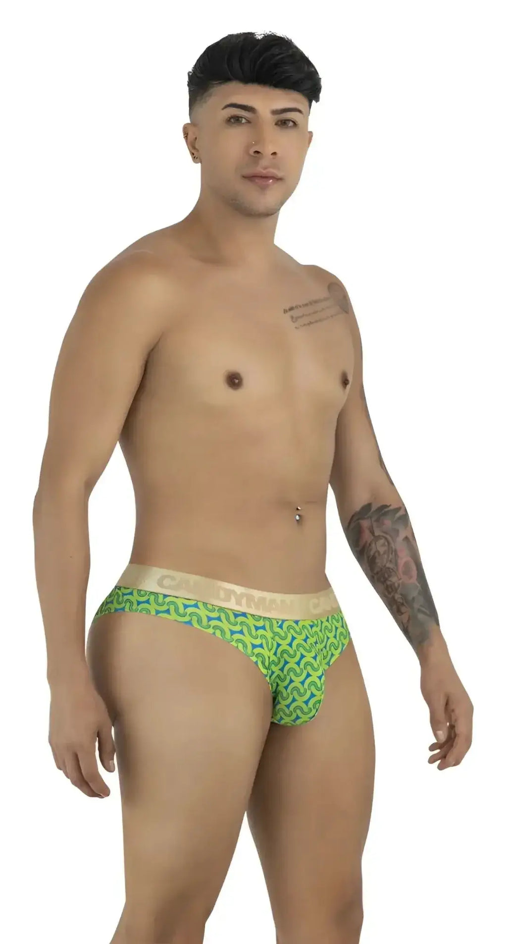 CandyMan 99926 printed green briefs in a lifestyle shot showing a front-side view on a male model.