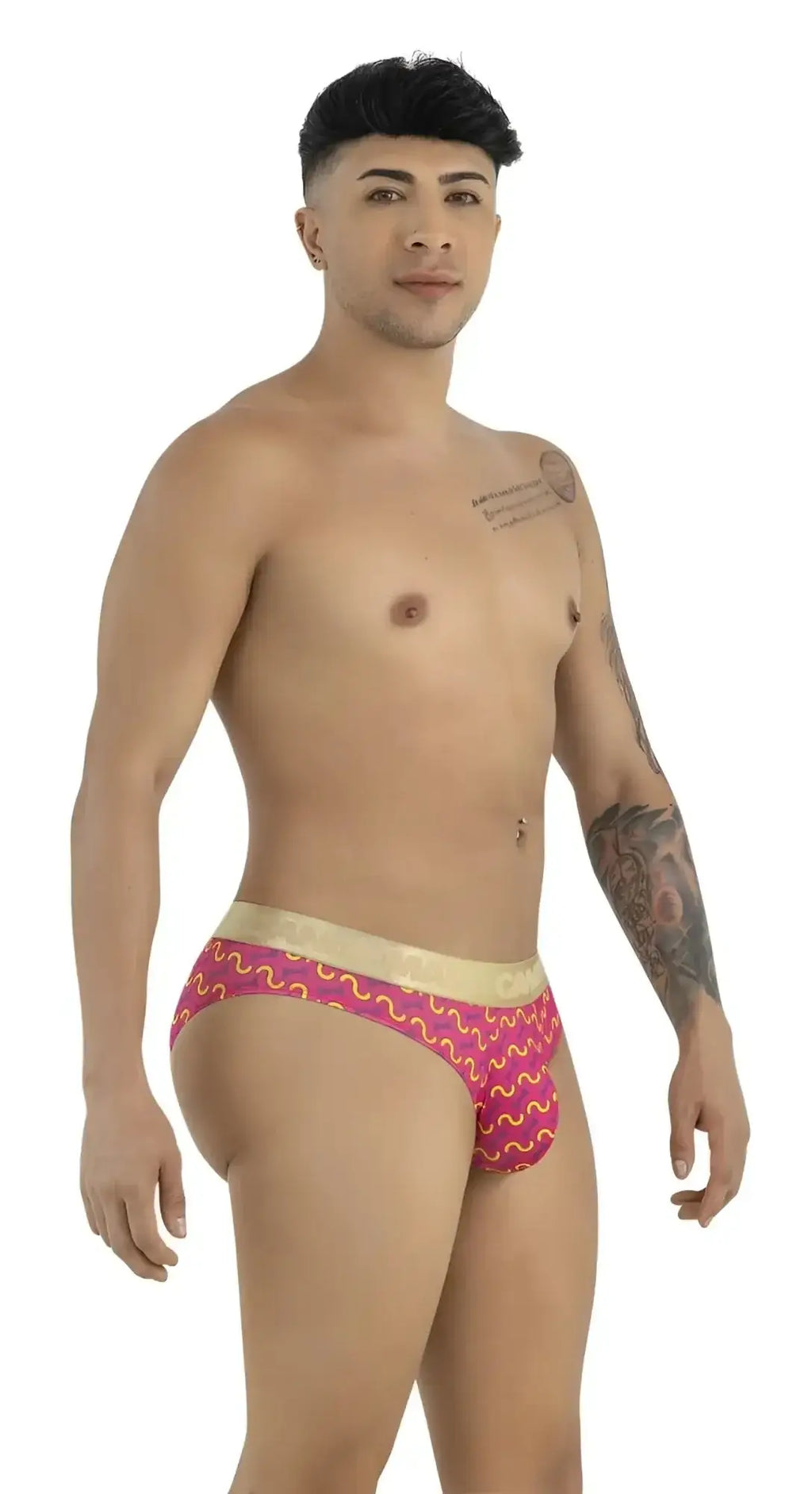 CandyMan 99926 briefs in printed pink. Side view of a model wearing these bikini-style briefs.