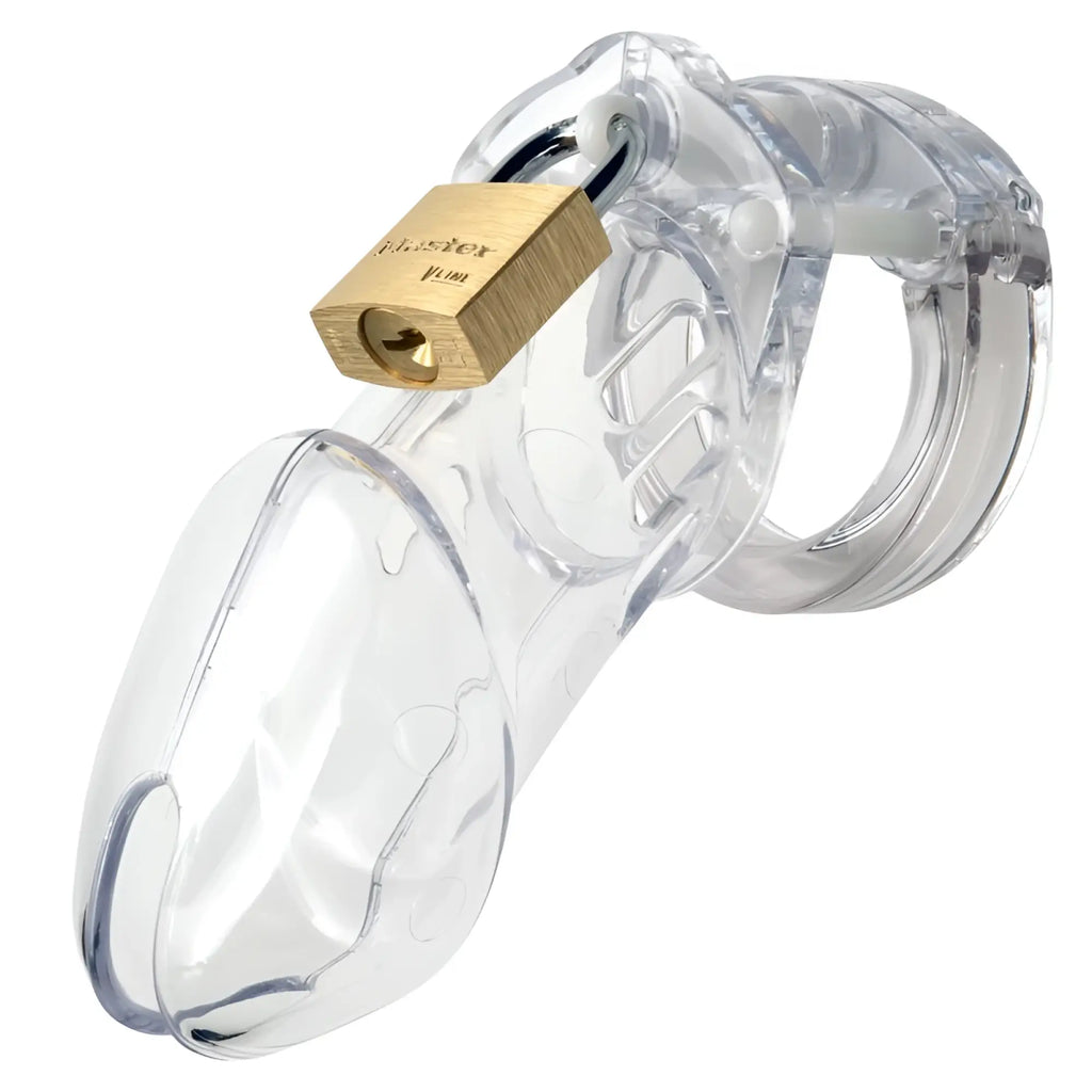 Clear plastic CB-X cockcage CB-6000 with a gold-colored master lock padlock for secure chastity control