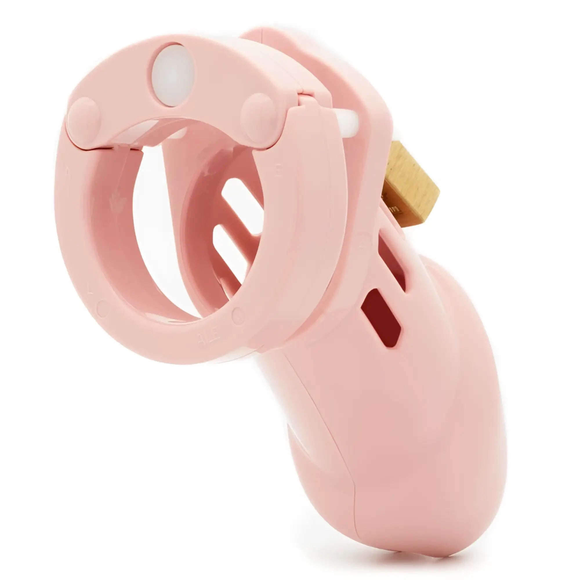 Pink plastic chastity device cb-x cockcage cb-6000 with gold-colored metal lock for secure wear