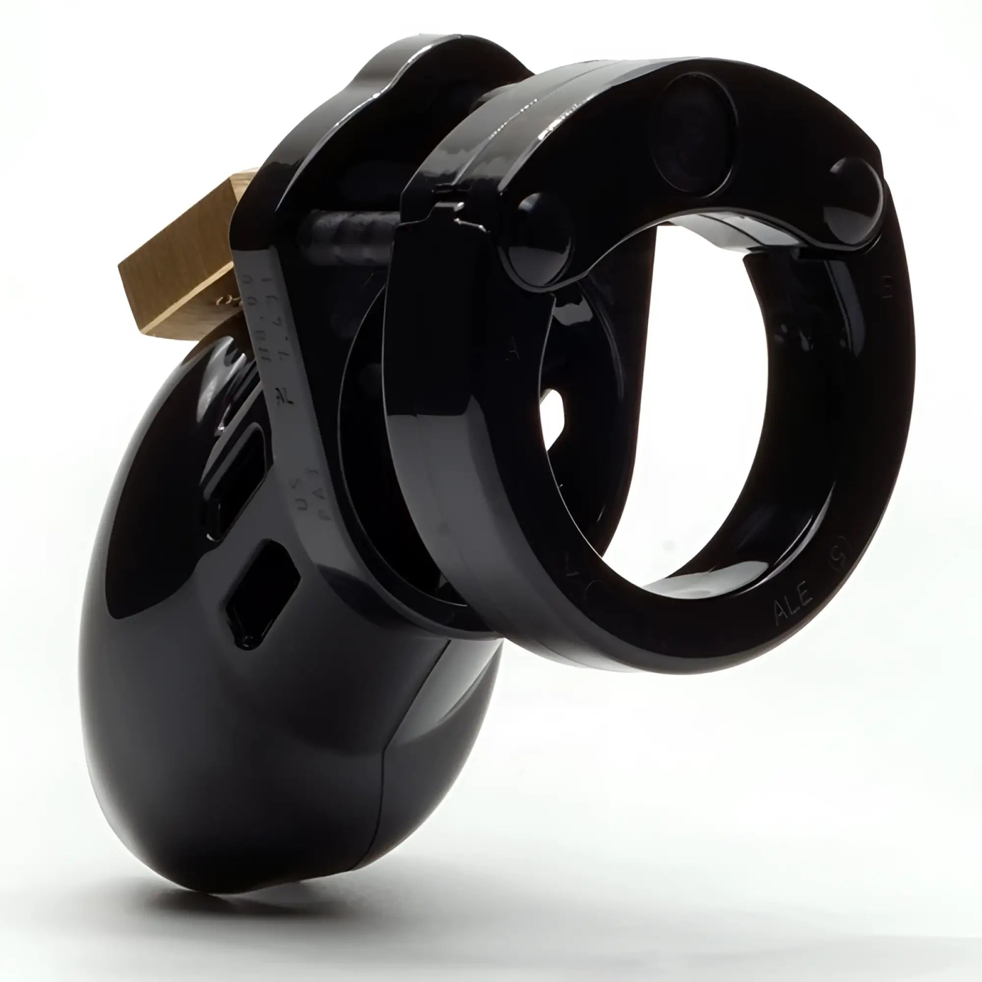 Black glossy cb-x cockcage cb-6000s with gold-colored lock designed for secure male chastity play