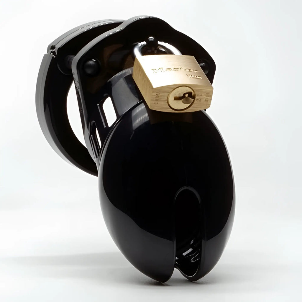 Black glossy plastic cb-x cockcage cb-6000s with gold master lock padlock for secure chastity play