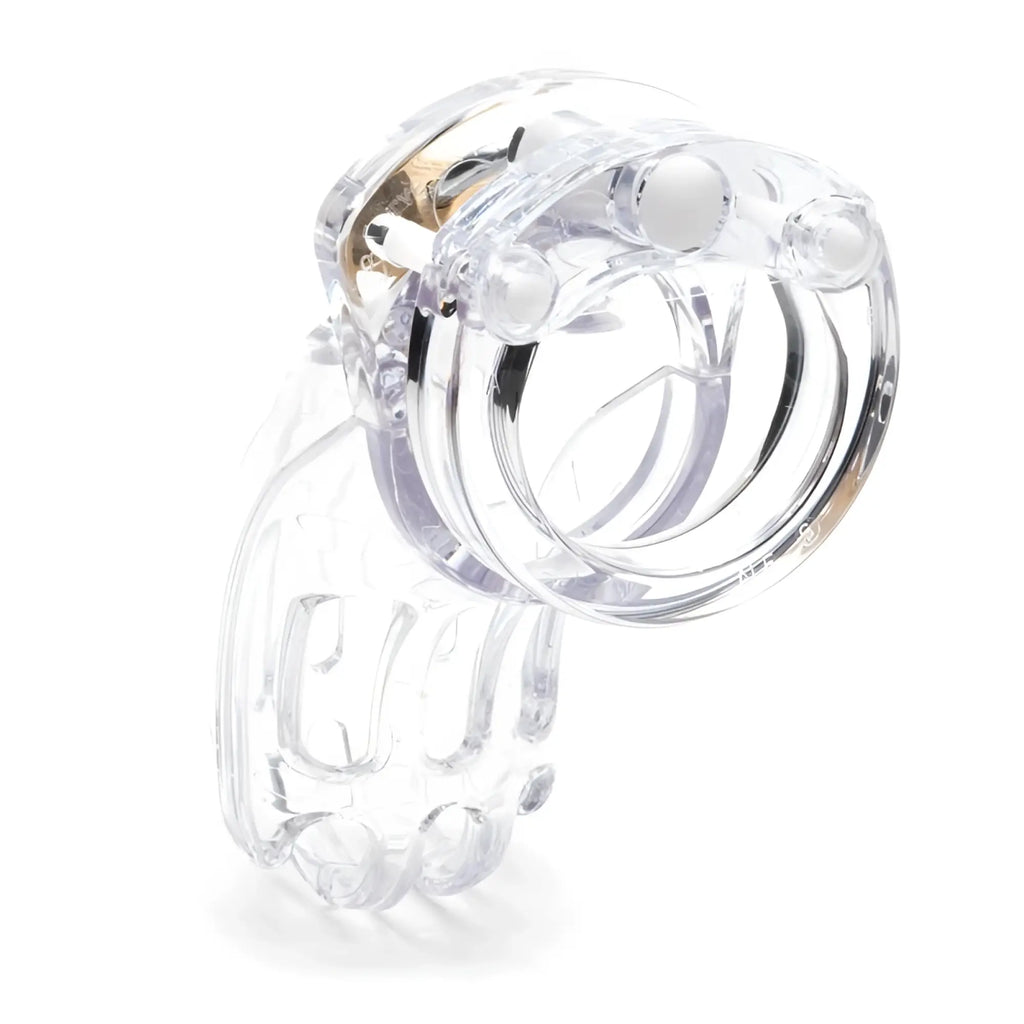 Clear plastic cockcage with gold-toned metal clasp and white spherical accents cb-x cockcage the curve clear