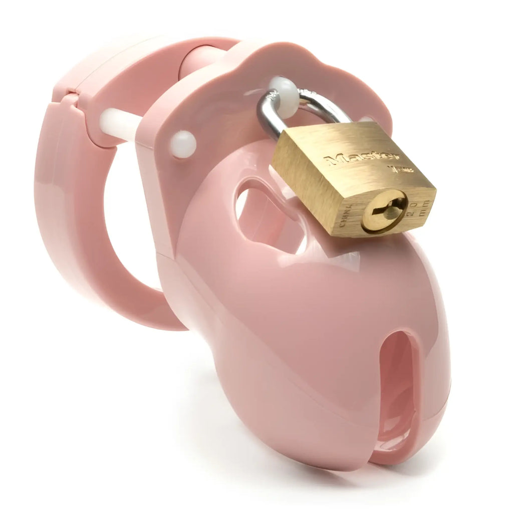 Pink plastic cockcage cb-x mr stubb with brass padlock designed for secure chastity play use