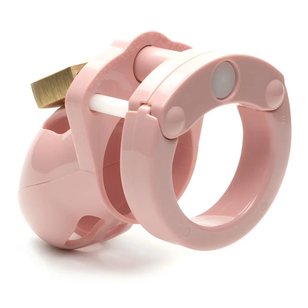 Pink plastic cockcage chastity device cb-x mr stubb with gold metal lock for secure wear