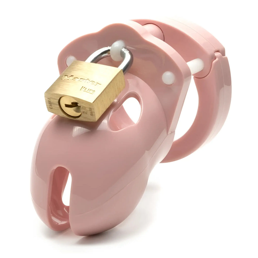 Pink plastic cockcage CB-X Mr Stubb with gold master brand lock attached for secure chastity play