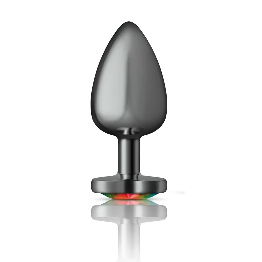 A sleek matte black metallic cheeky charms gunmetal butt plug with a smooth teardrop head and rainbow led base
