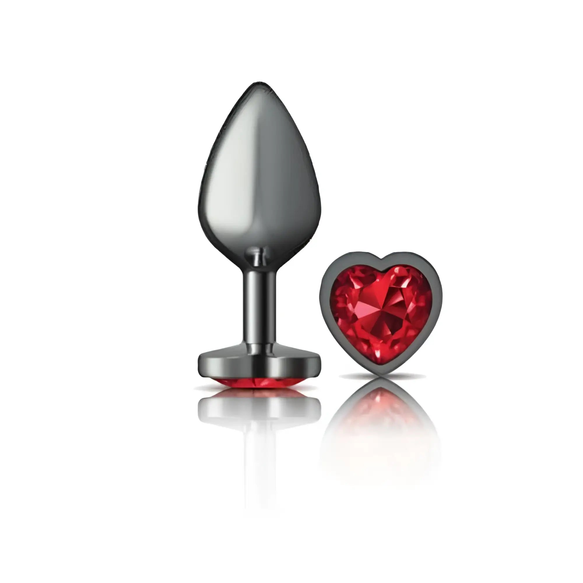 A sleek dark gray metallic gunmetal butt plug with a red heart-shaped jewel base and matching crystal accessory