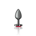 A sleek matte black chewky charms gunmetal butt plug with a red illuminated heart jewel base small size