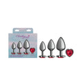 Set of four gunmetal metallic anal plugs with a dark red heart-shaped gemstone charm from Cheeky Charms kit