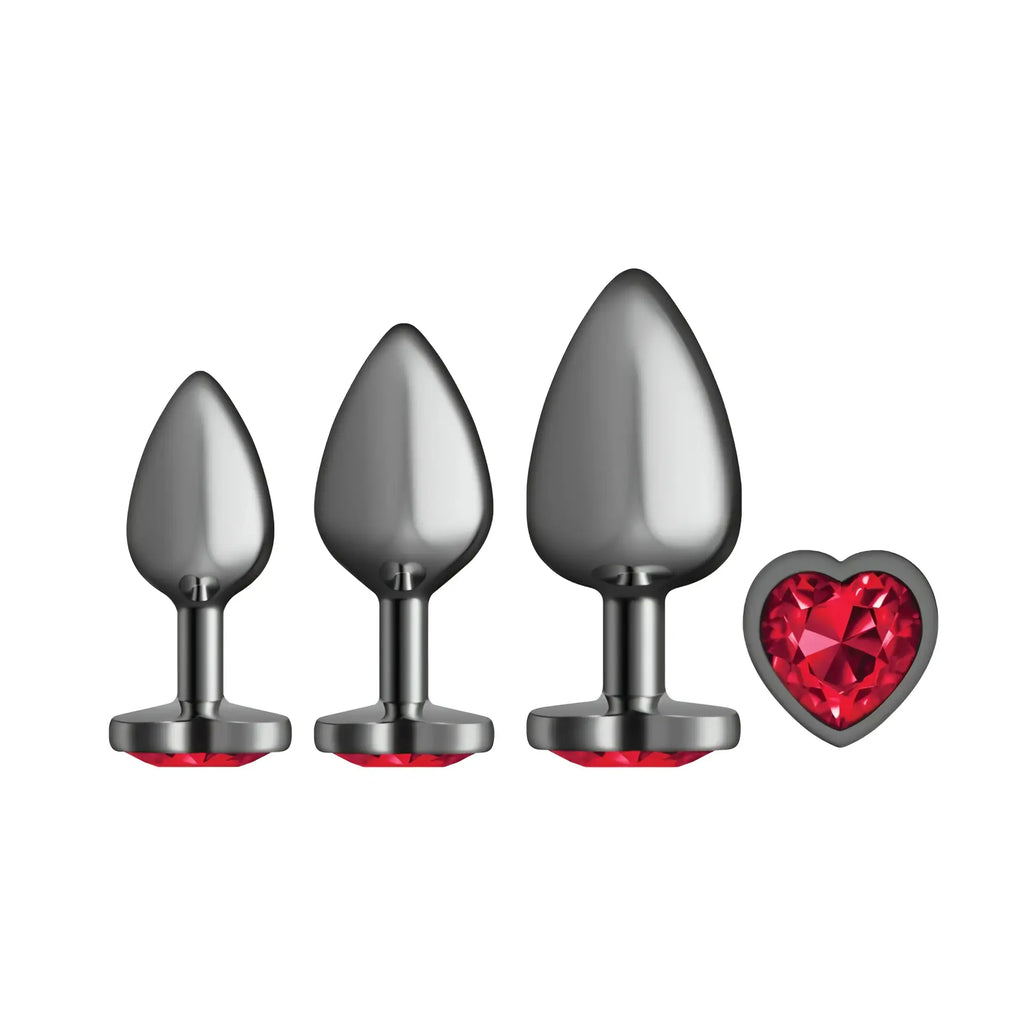 Set of three gunmetal metal butt plugs with dark red heart-shaped jewel bases for intimate use by Cheeky Charms