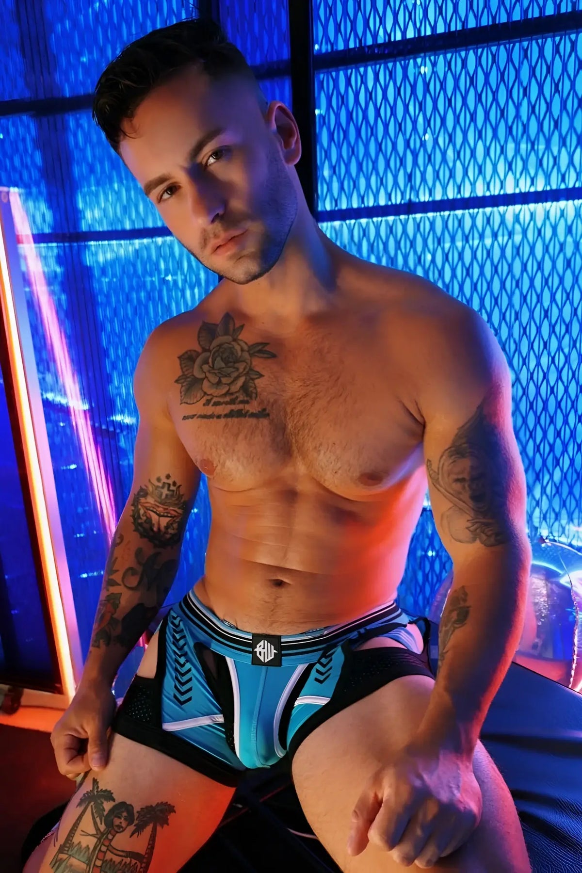 Blue and black circuit breaker chock athletic briefs with white logo on waistband for active wear