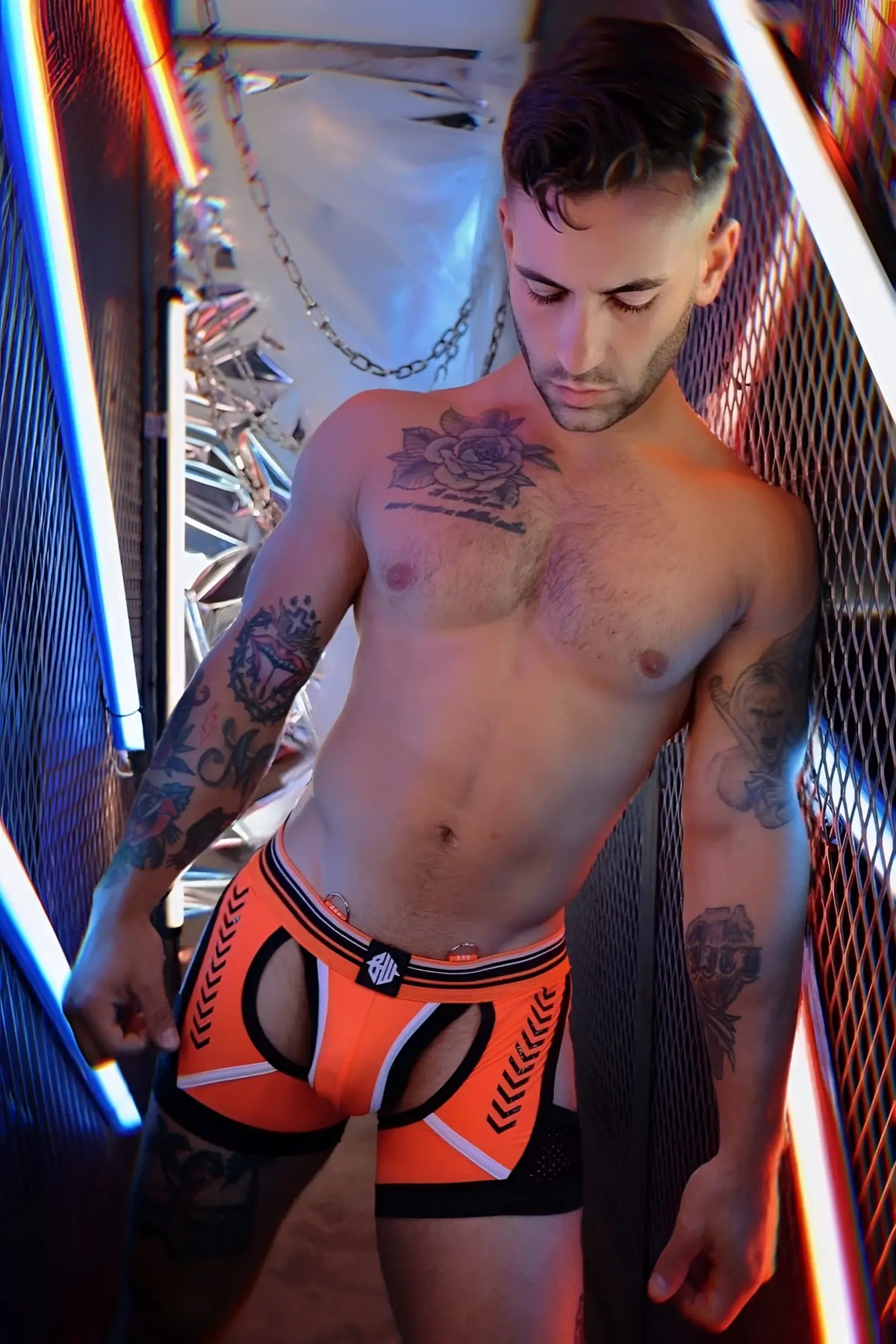 Circuit breaker chock orange and black athletic briefs with white chevron detailing and branded waistband logo