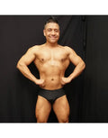 Black bodybuilding posing suit by Arroyman featuring a classic cut worn by a model showcasing physique.