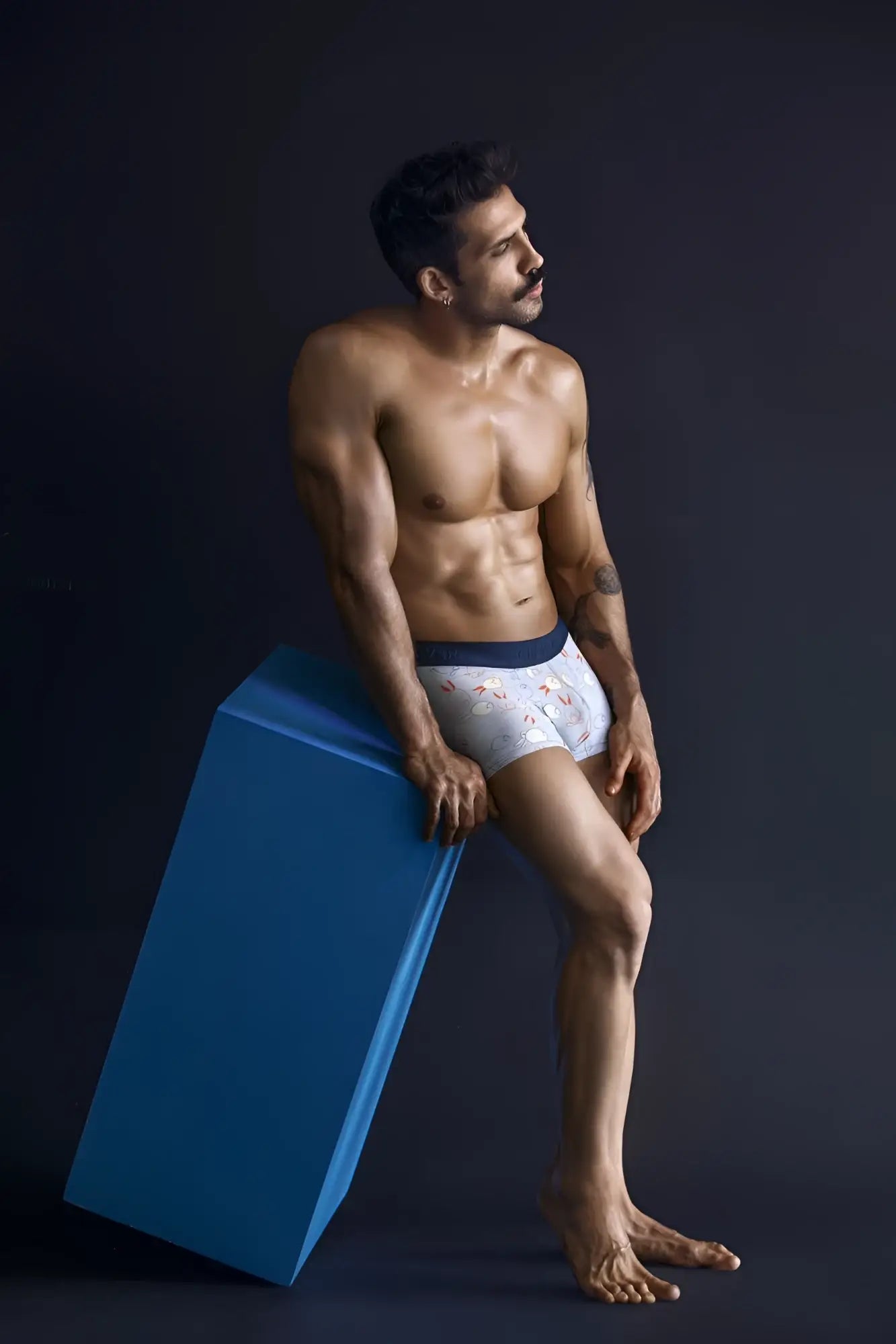 White boxer briefs clever 1723 coney trunks with subtle floral pattern and navy blue waistband in blue color