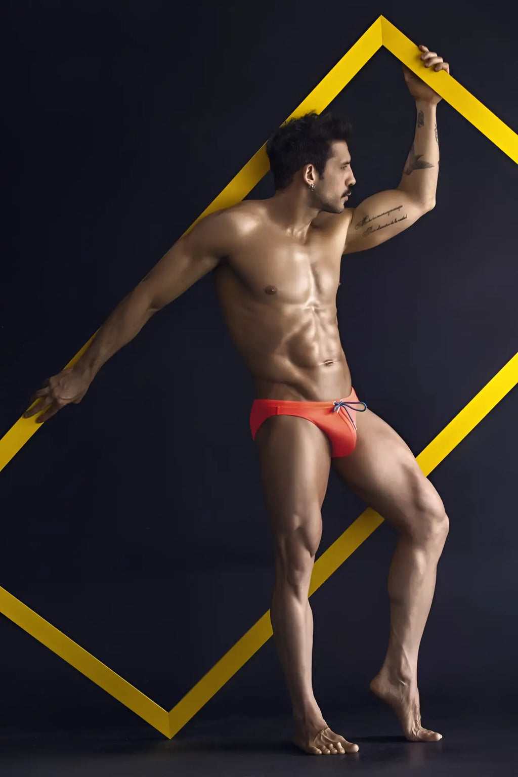 Orange clever 1735 vivo swim briefs with drawstring waistband designed for comfortable swimming and beachwear