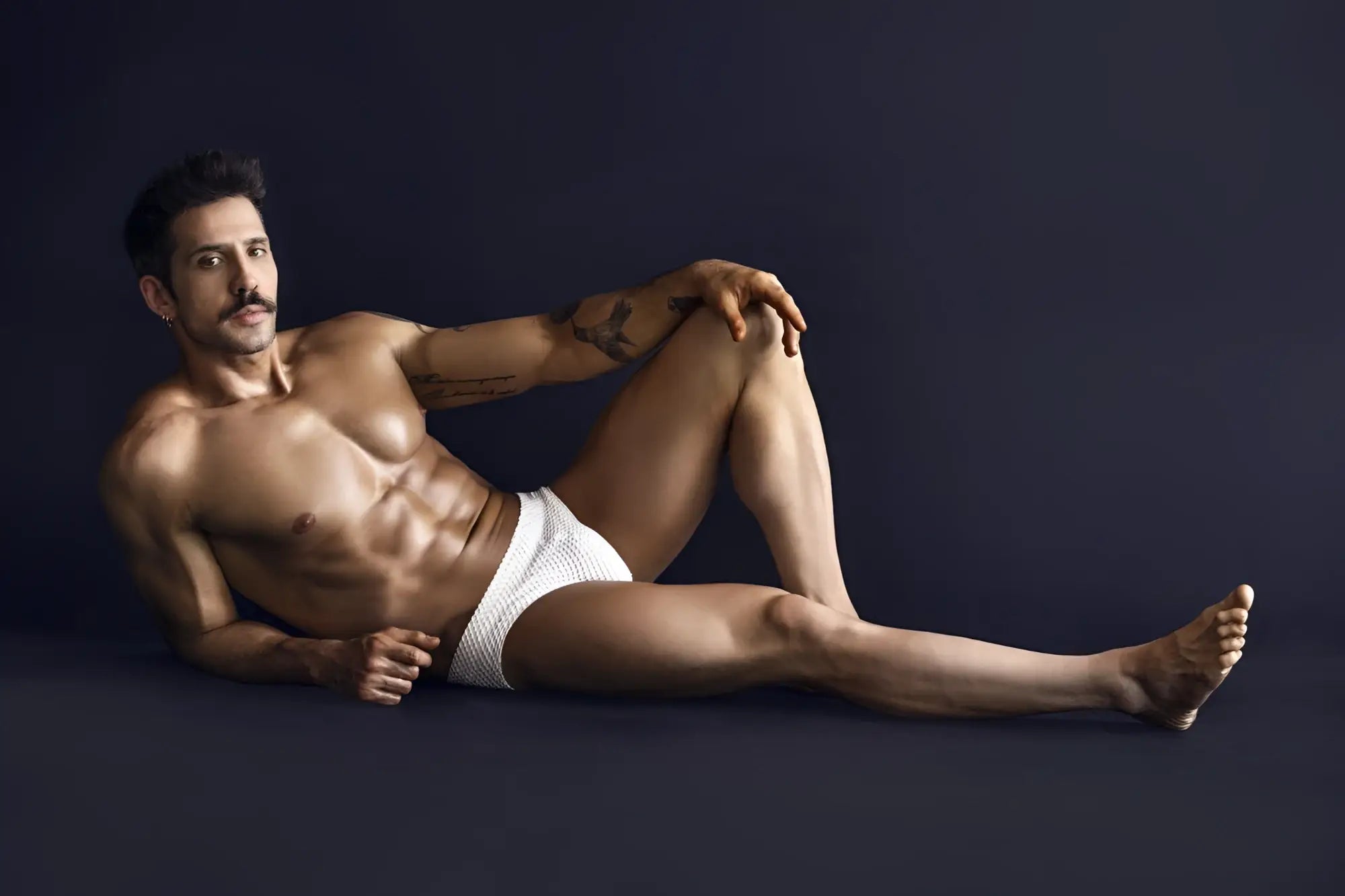 White clever 1743 island swim briefs with textured fabric designed for comfortable swimwear use