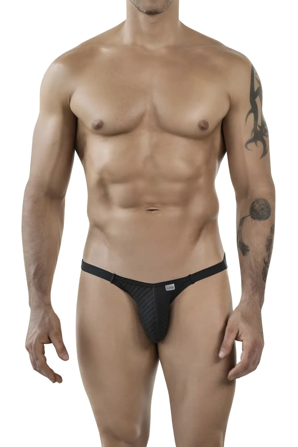 Black textured thong with a sleek form-fitting design from clever 1846 mantra bikini in color black shown from the back