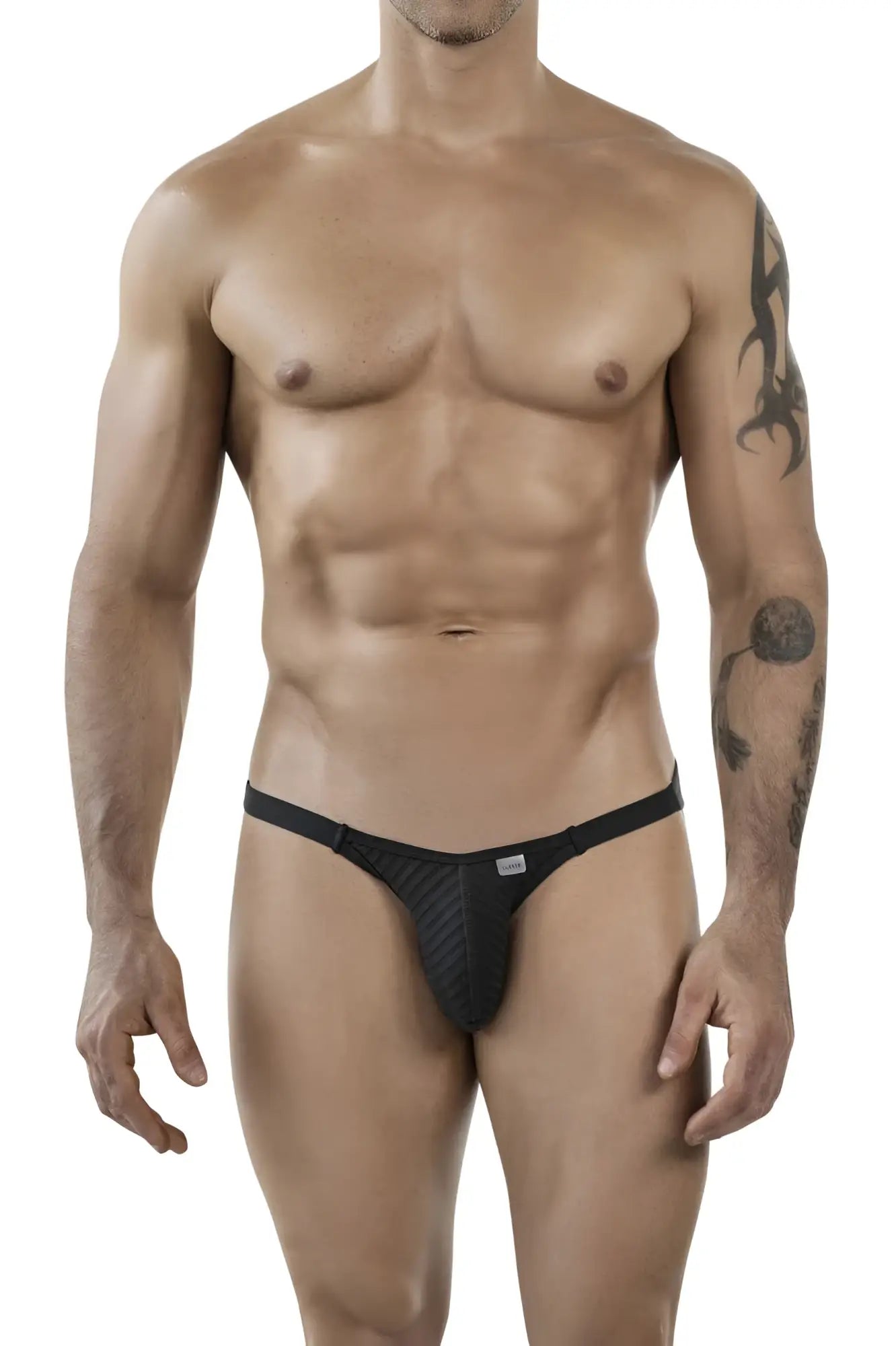 Black textured thong with a sleek form-fitting design from clever 1846 mantra bikini in color black shown from the back