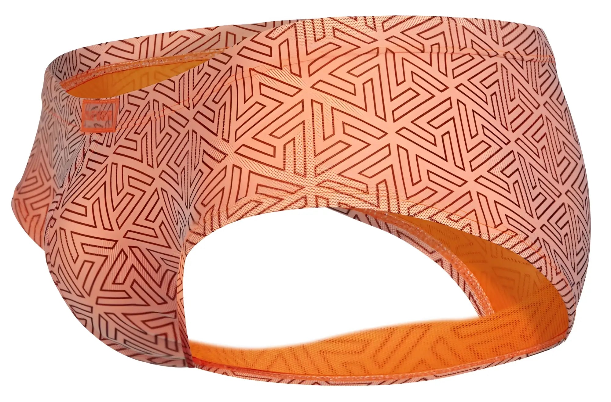 A peach-colored geometric patterned headband with orange inner lining from clever 2017 neon briefs color orange collection