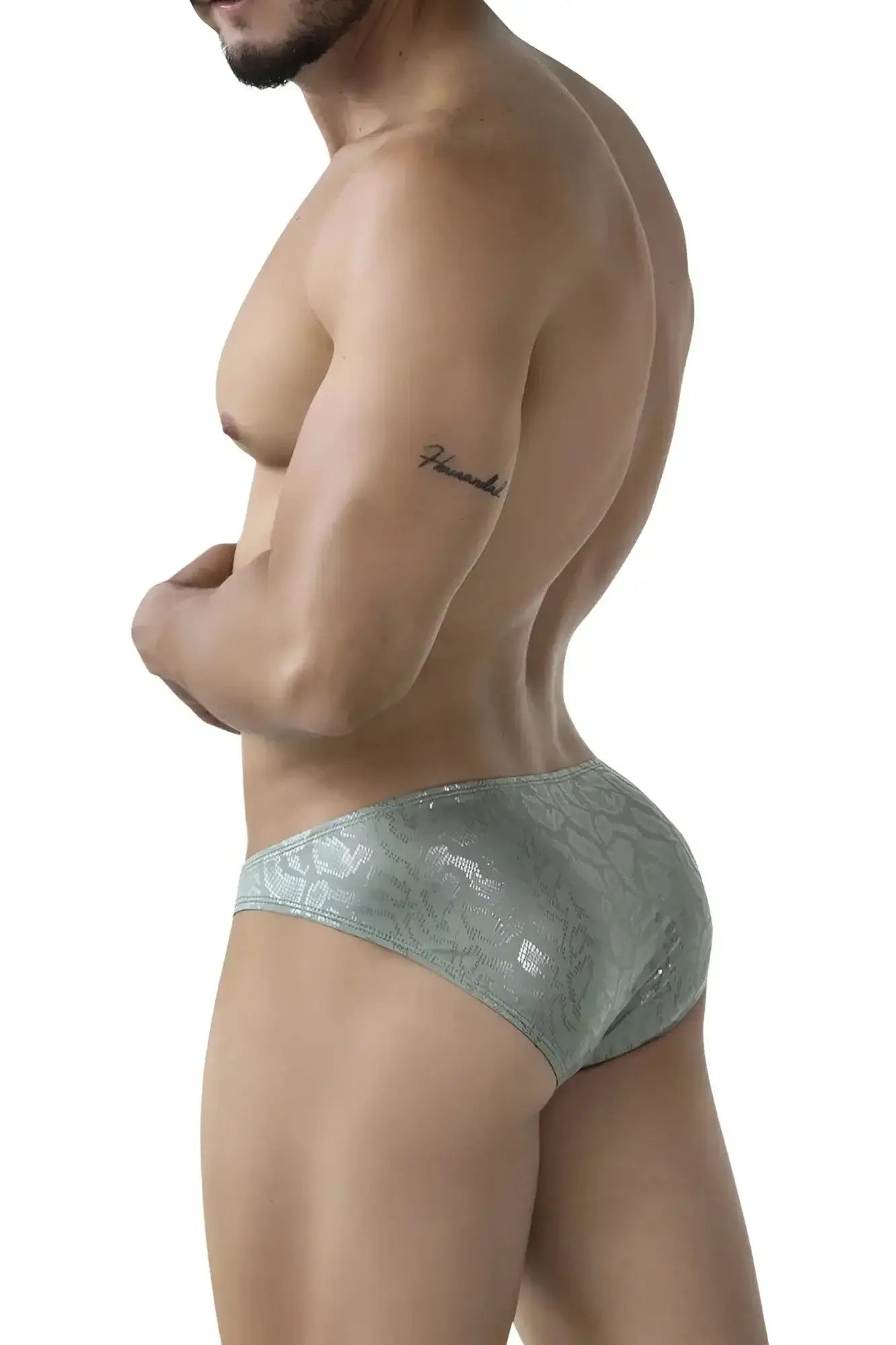 A sleek light green clever 2040 luxe brief with lace trim and subtle shimmering pattern
