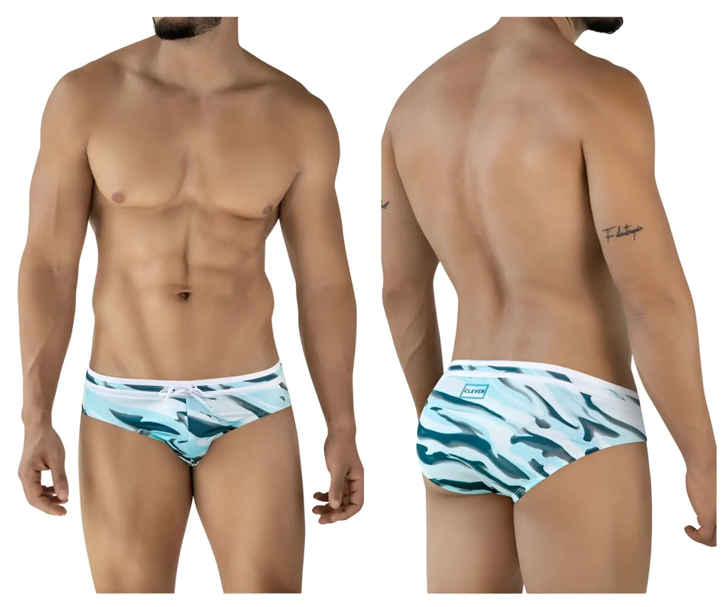 Men’s clever 2067 baru swim briefs in blue feature bold teal and white abstract wave pattern with branded waistband logo