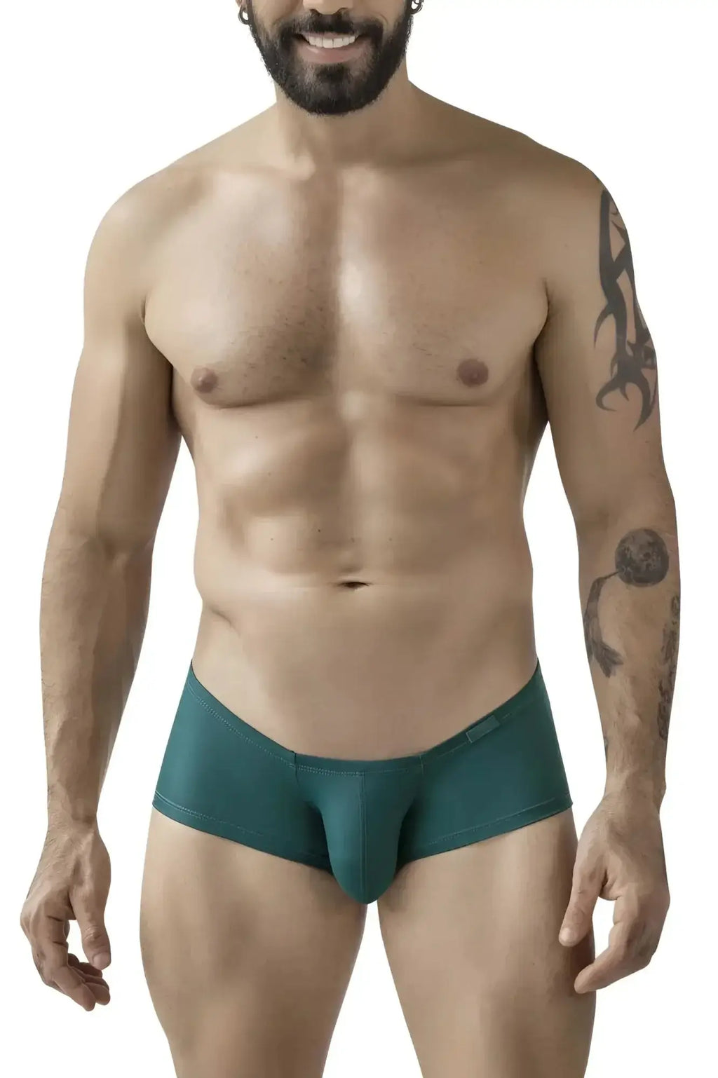 Teal-colored form-fitting men’s briefs with smooth fabric finish.